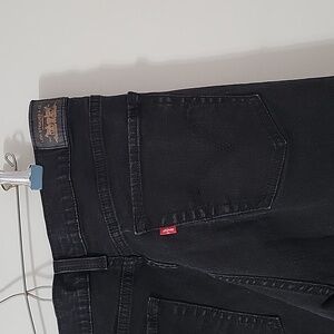 Levi Perfectly slimming boot cut 512 jeans black size 18 short.